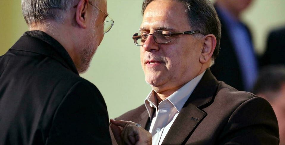 head of the Central Bank of Iran, Valiollah Seif (R)